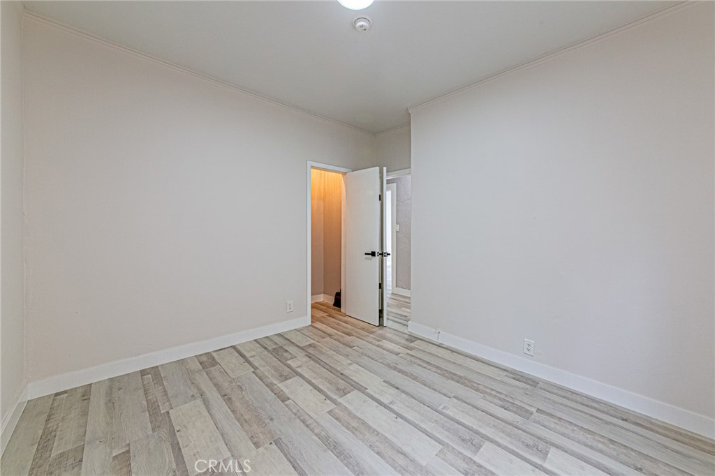 5355 West 8th Street Los Angeles, CA 90036 - Photo 31 of 32 a view of room with wooden floor
