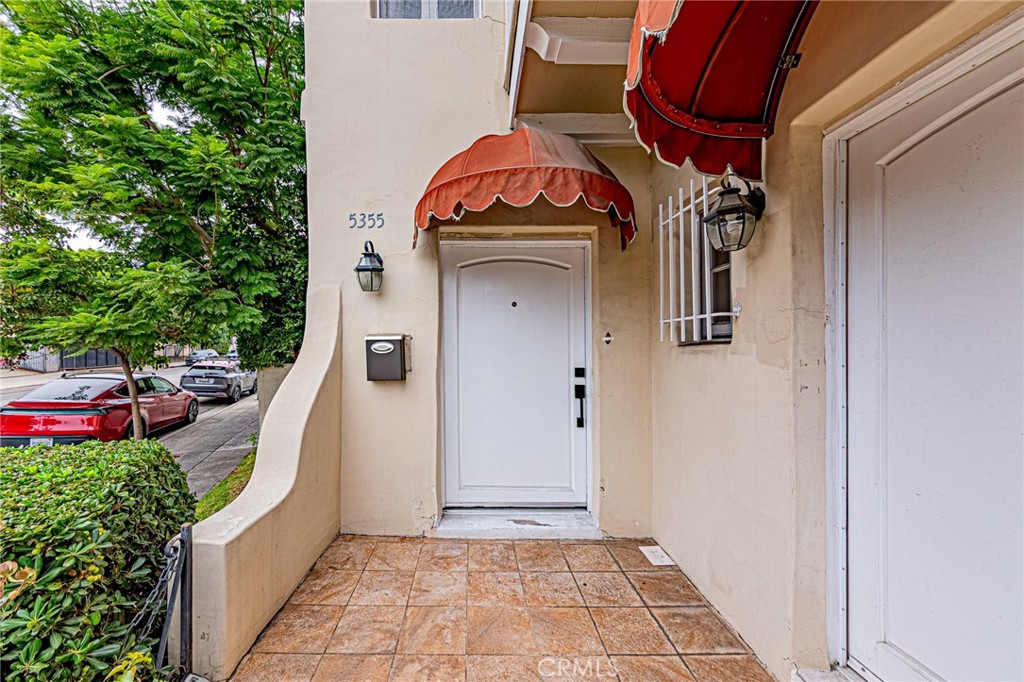5355 West 8th Street Los Angeles, CA 90036 - Photo 9 of 32 a view of a house with a small porch