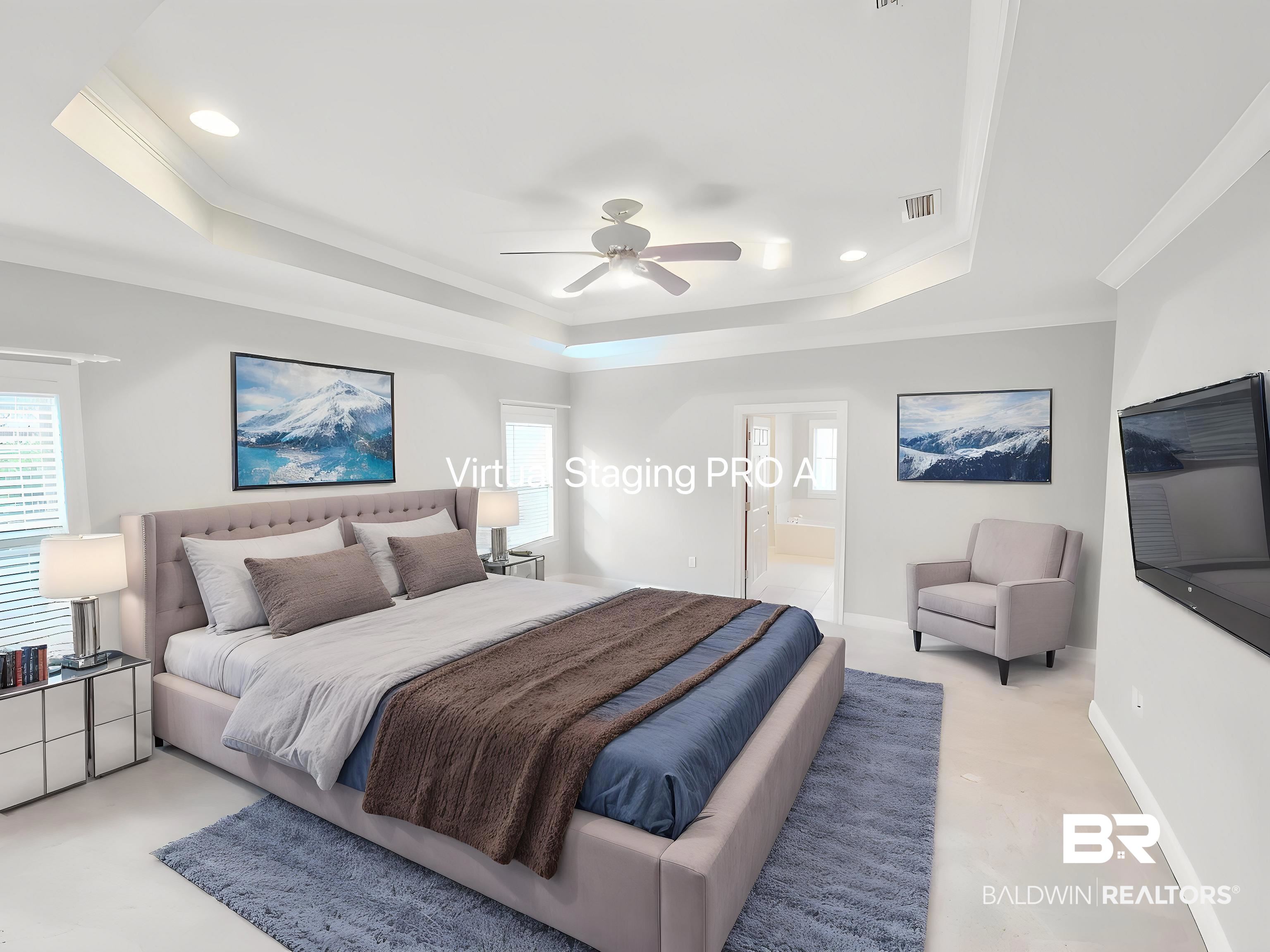 306 South Tee Drive Fairhope, AL 36532 - Photo 15 of 37 Bedroom featuring a tray ceiling, light colored carpet, baseboards, recessed lighting, and connected bathroom