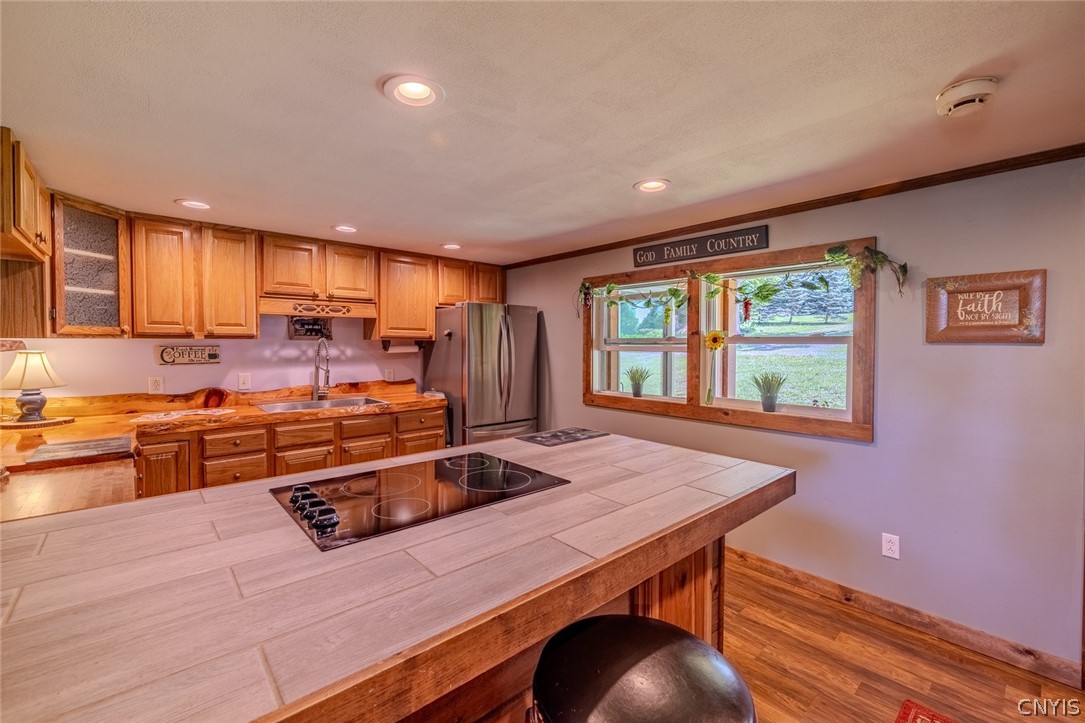 7037 Townline Road Rome, NY 13440 - Photo 7 of 48 beauty meets functionality. windows open up to the