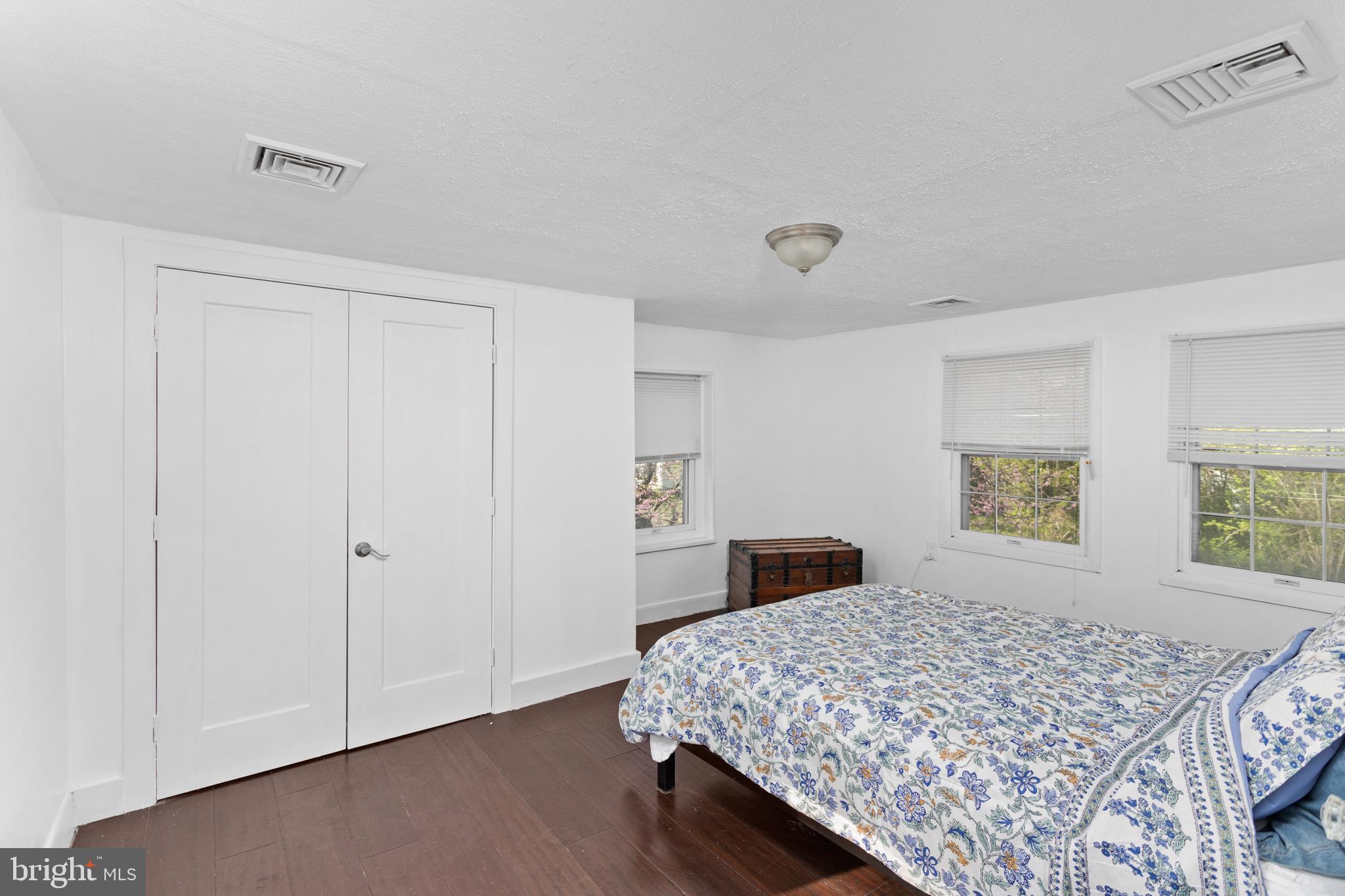 942 Province Line Road Allentown, NJ 08501 - Photo 38 of 50 a bedroom with a large bed and a window