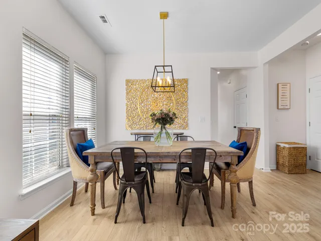 a view of living room with furniture and rug