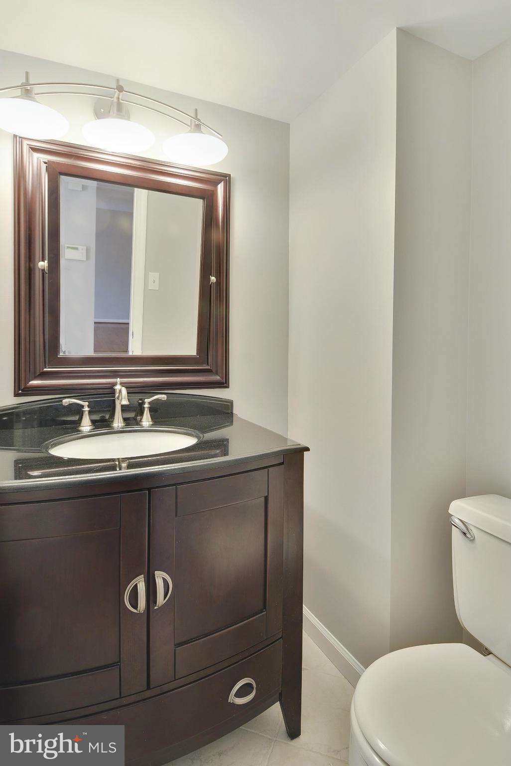 924 Moorefield Creek Road Southwest Vienna, VA 22180 - Photo 11 of 30 Main level half bath