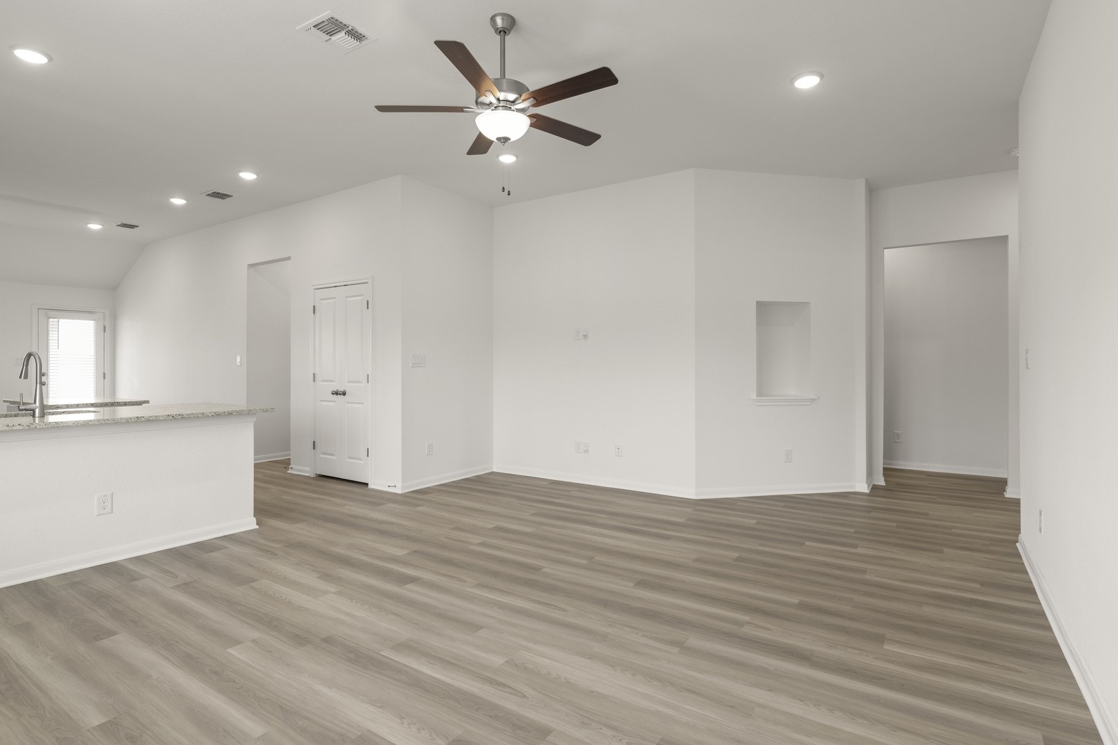 3729 Pin Oak Hills Seguin, TX 78155 - Photo 12 of 22 Unfurnished living room with recessed lighting, a ceiling fan, light wood-style floors, and vaulted ceiling