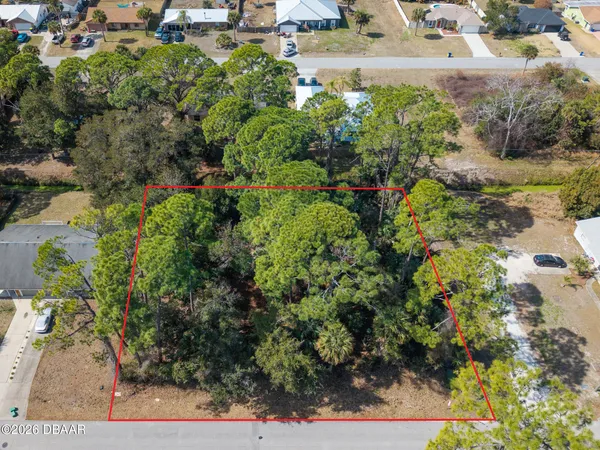 an aerial view of residential house with outdoor space