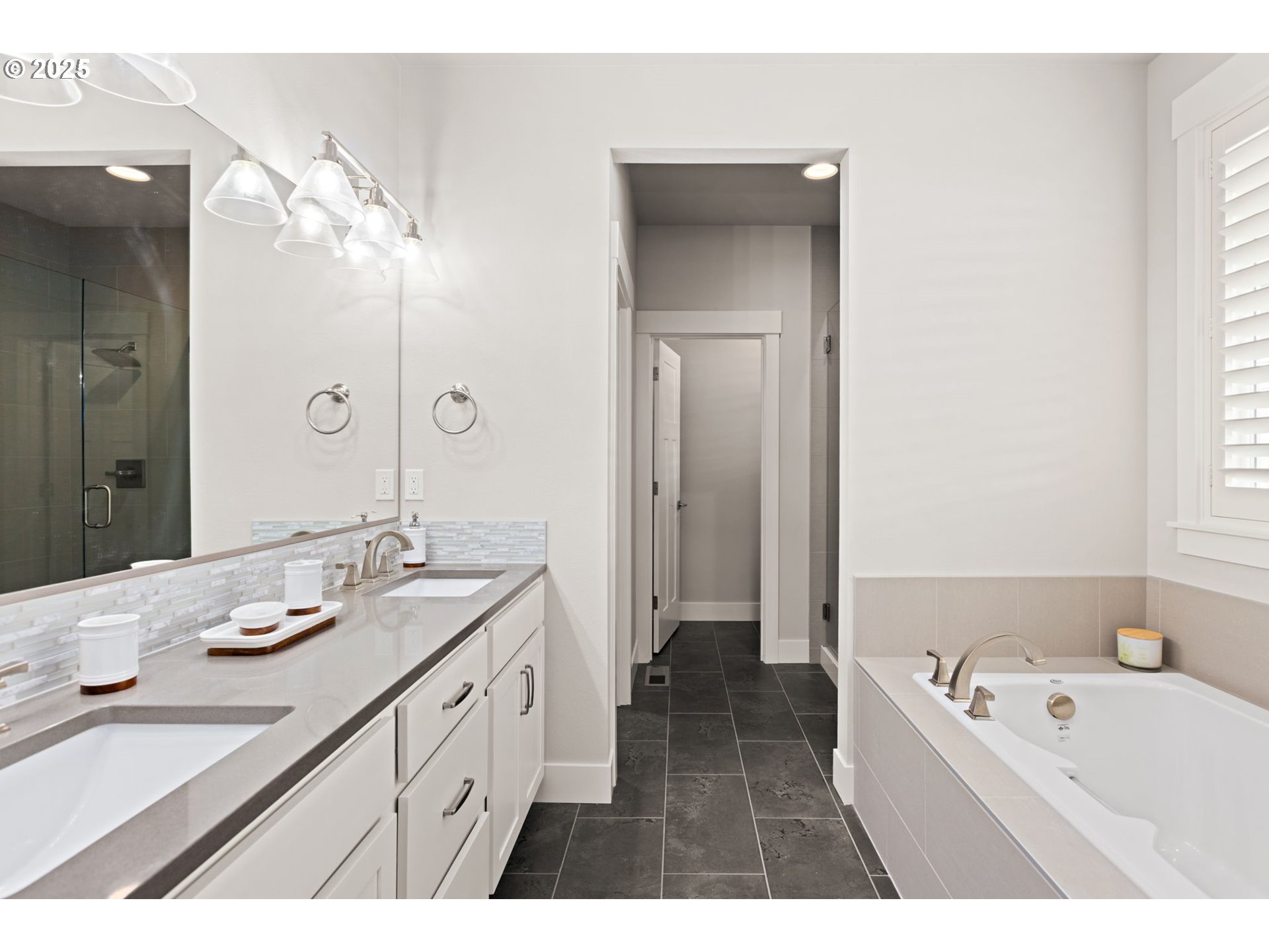 36904 Salmonberry Avenue Sandy, OR 97055 - Photo 15 of 44 a spacious bathroom with a tub sink and mirror