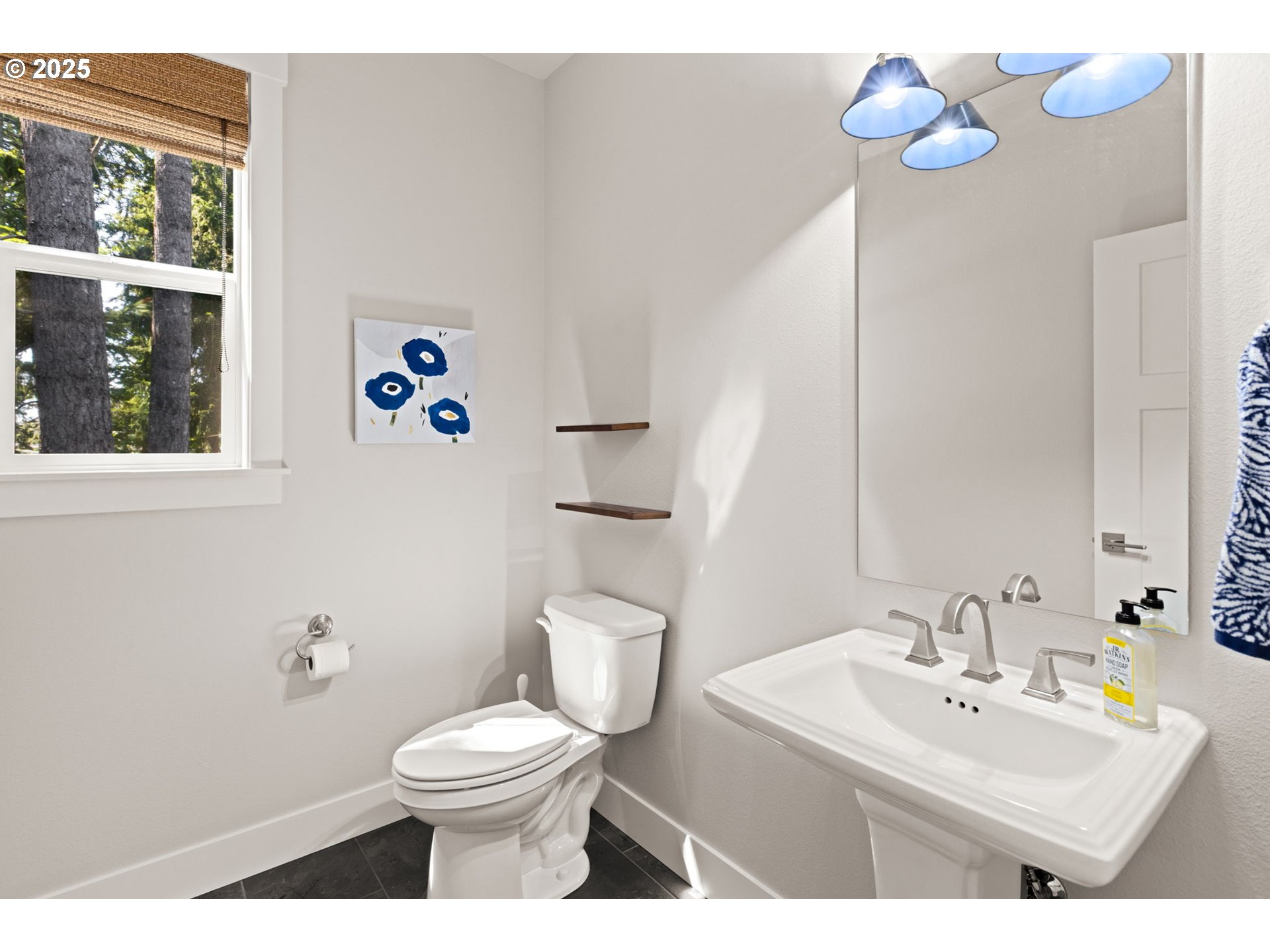 36904 Salmonberry Avenue Sandy, OR 97055 - Photo 19 of 44 a bathroom with a sink a toilet and a mirror