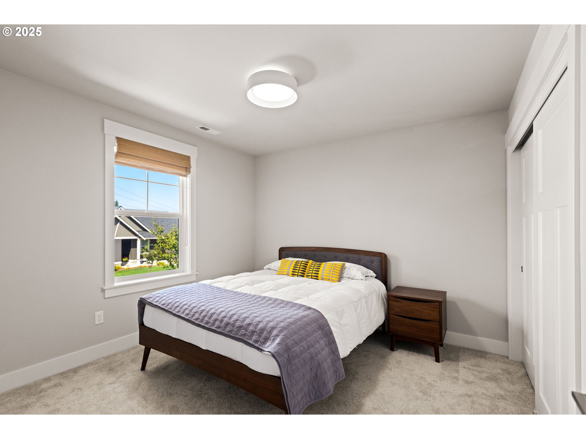 36904 Salmonberry Avenue Sandy, OR 97055 - Photo 25 of 44 a bedroom with a bed and a window