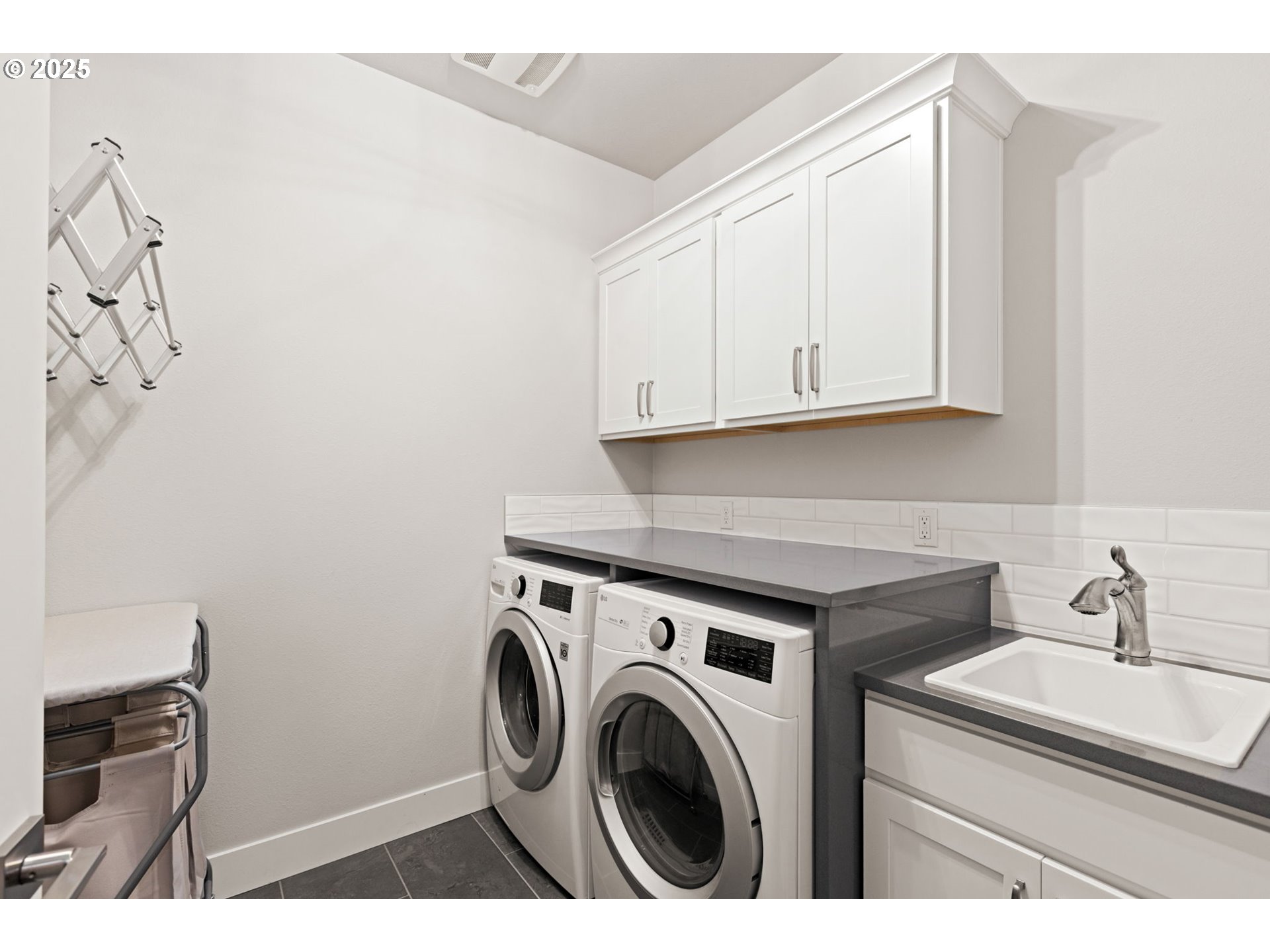 36904 Salmonberry Avenue Sandy, OR 97055 - Photo 26 of 44 a utility room with dryer and washer