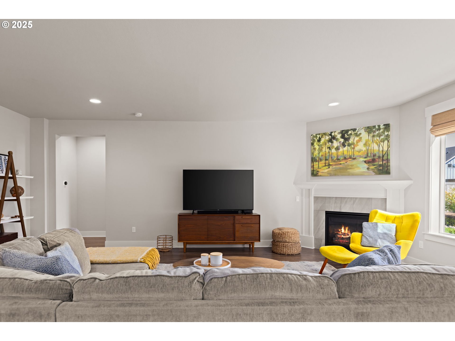 36904 Salmonberry Avenue Sandy, OR 97055 - Photo 4 of 44 a living room with furniture and a flat screen tv