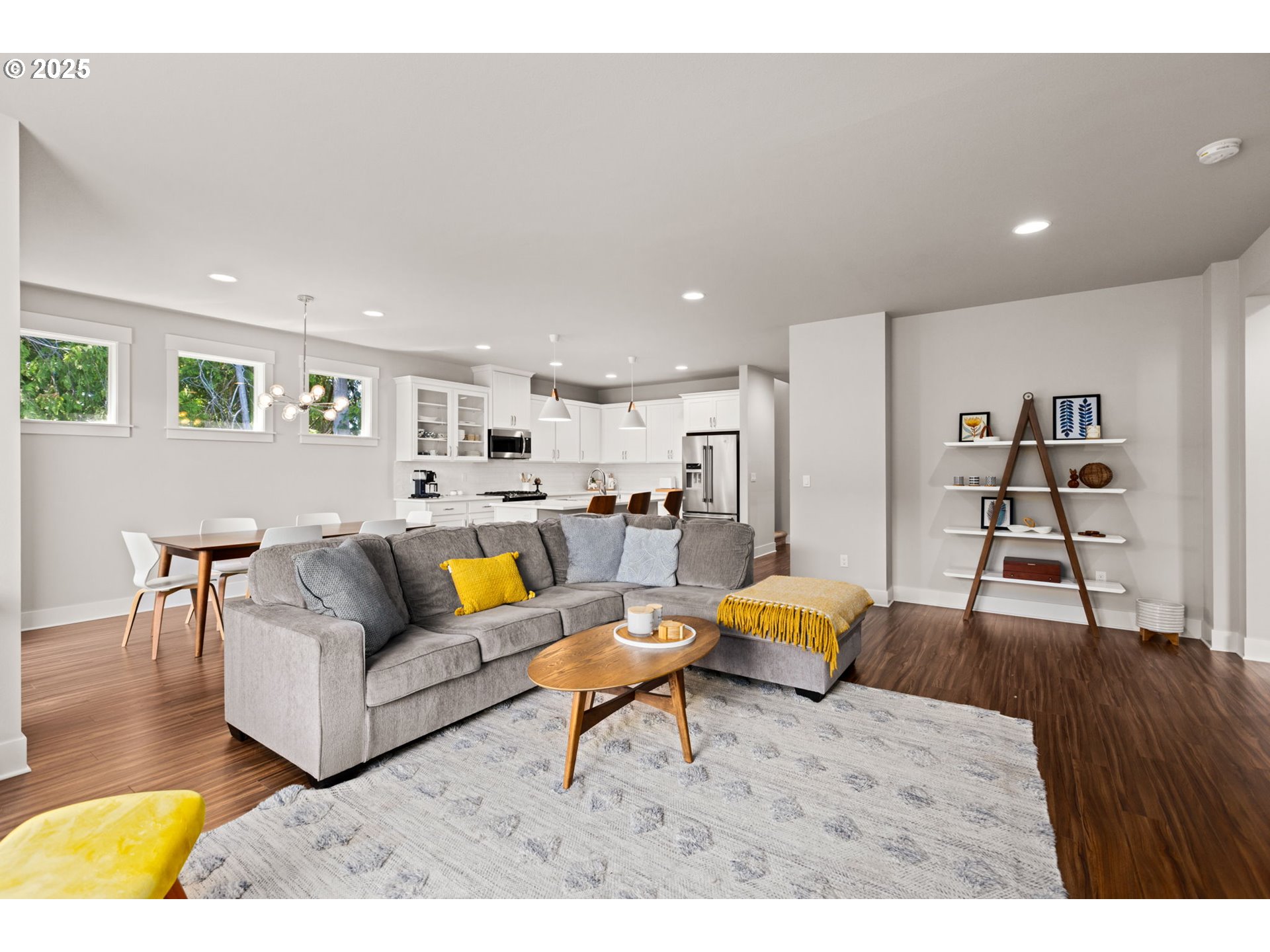 36904 Salmonberry Avenue Sandy, OR 97055 - Photo 5 of 44 a living room with furniture and kitchen view