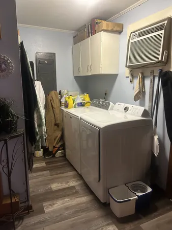 a bathroom with a sink toilet and mirror