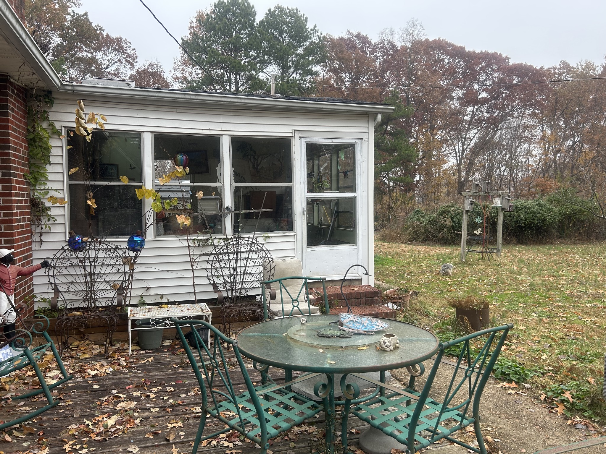 700 Corinth Road Sharon, TN 38255 - Photo 2 of 26 a backyard of a house with table and chairs