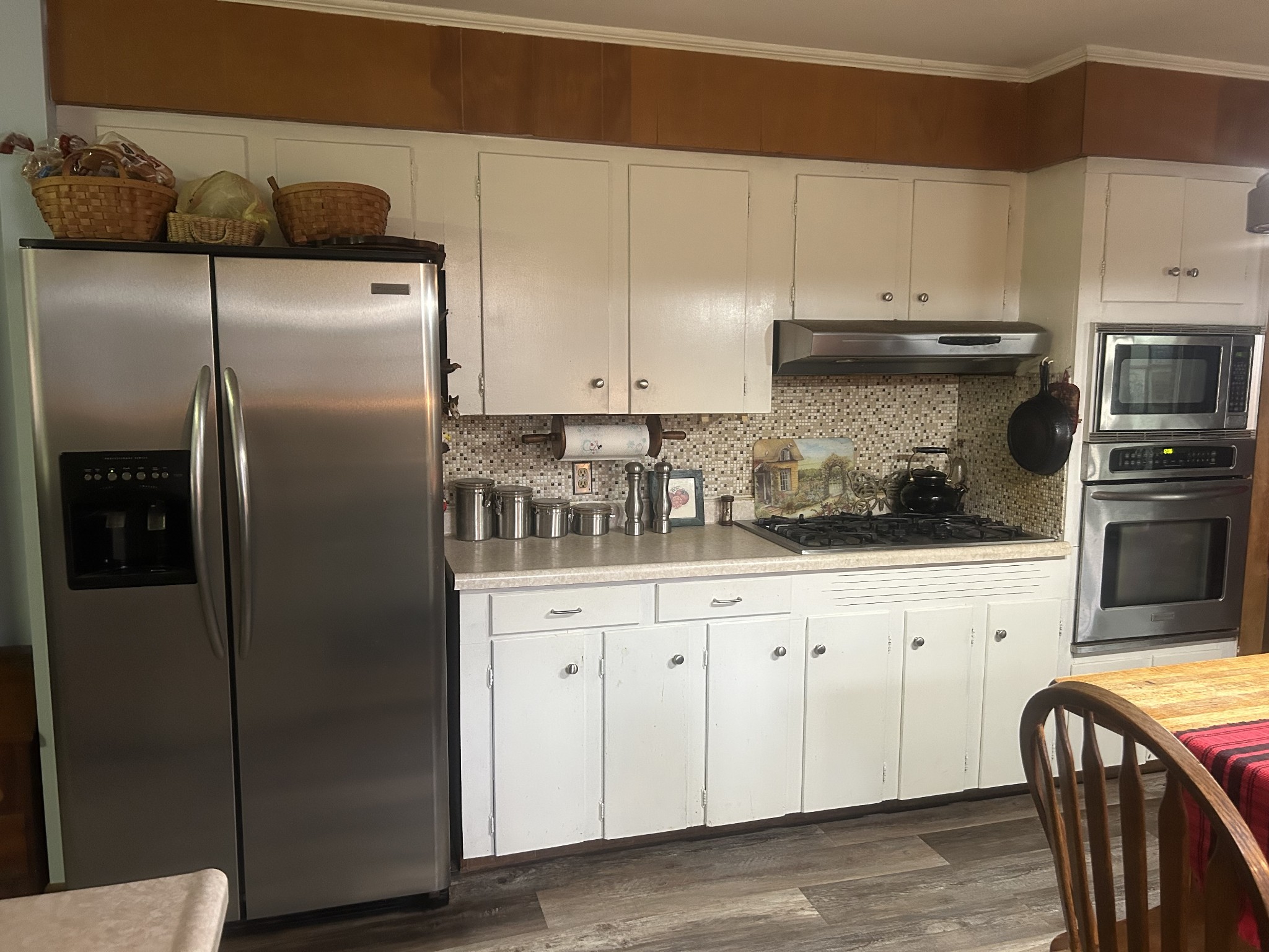 700 Corinth Road Sharon, TN 38255 - Photo 3 of 26 a kitchen with stainless steel appliances granite countertop a refrigerator a stove and a sink