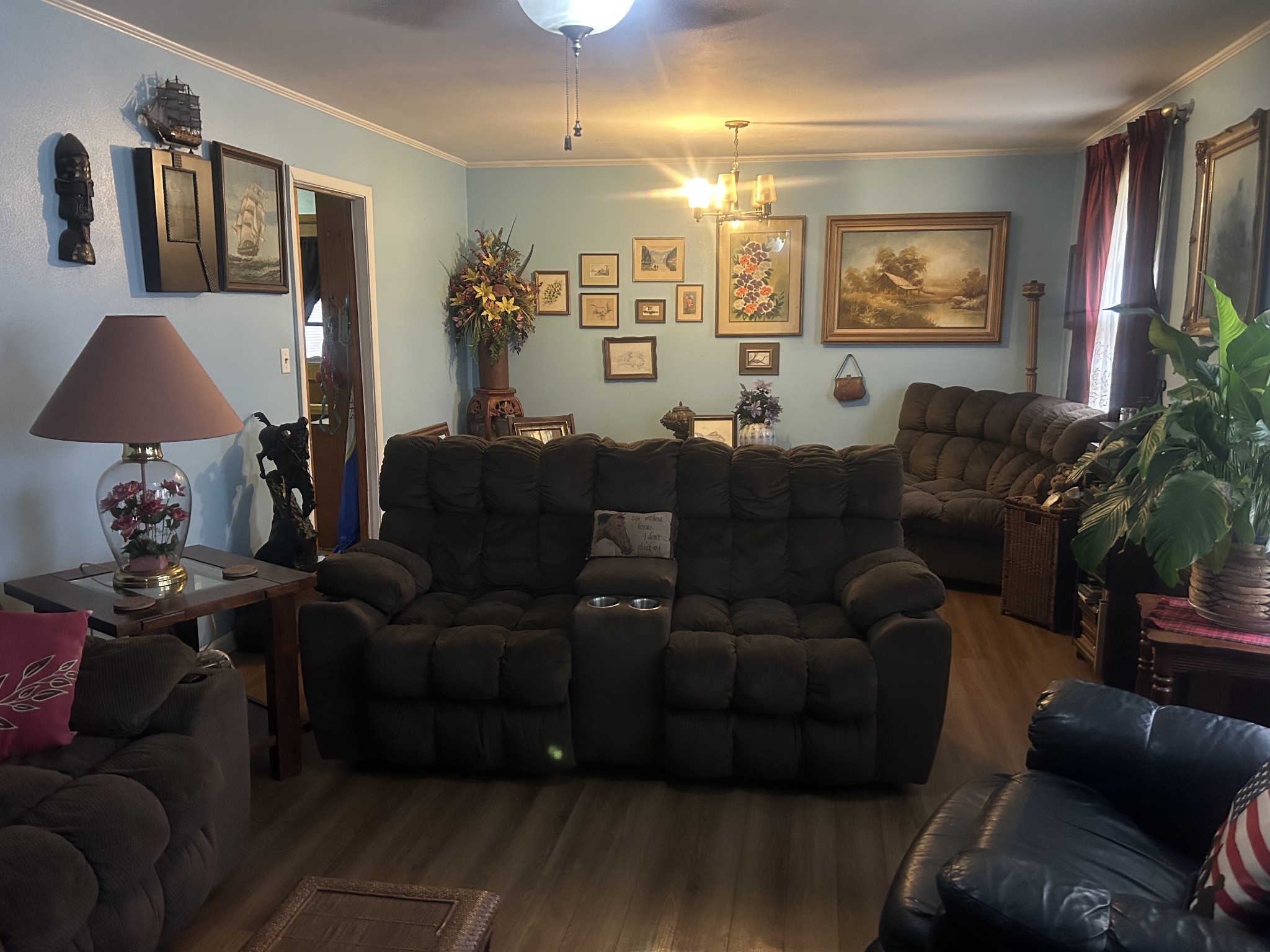 700 Corinth Road Sharon, TN 38255 - Photo 9 of 26 a living room with furniture and a lamp