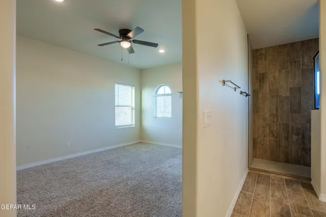 a kitchen with a sink and refrigerator