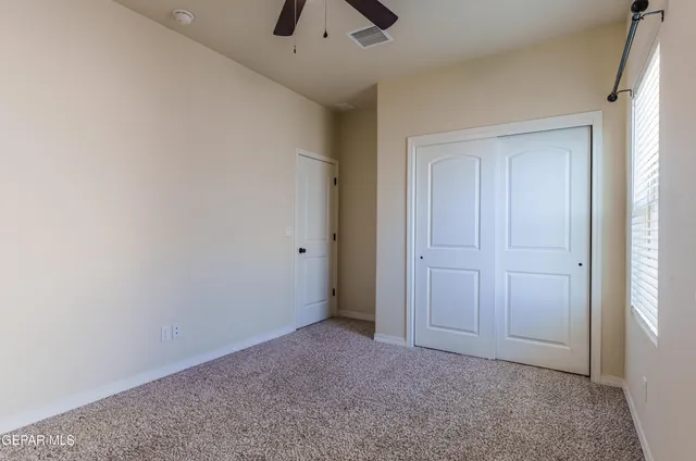 a view of yard with patio