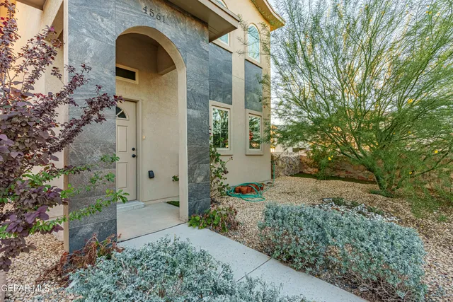 a front view of a house with an outdoor space