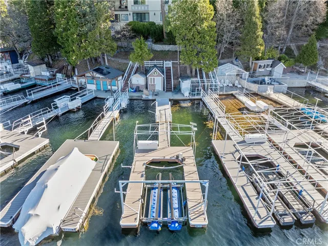 an aerial view of a house with a lake view
