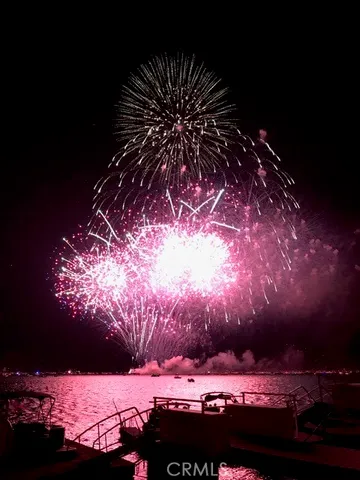 an aerial view of residential house with wooden fence