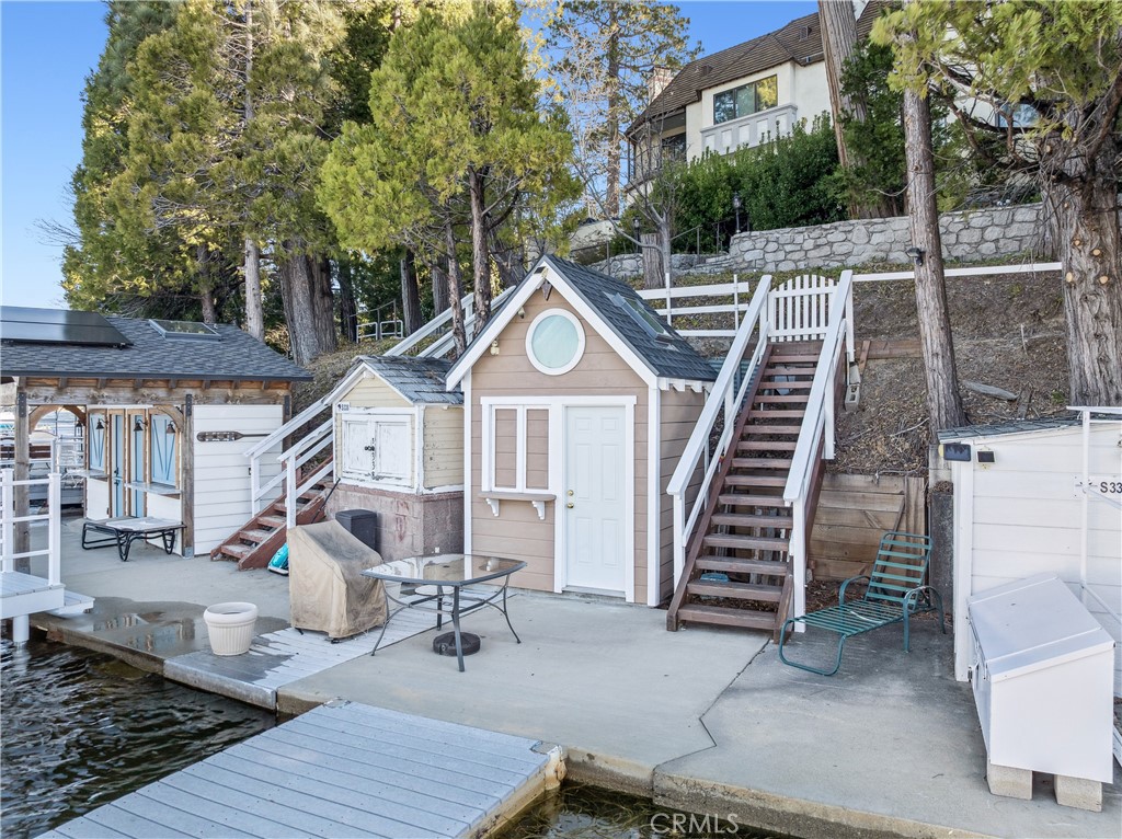 337 Single Slip Lake Arrowhead, CA 92352 - Photo 7 of 22 a view of a house with wooden stairs and stairs