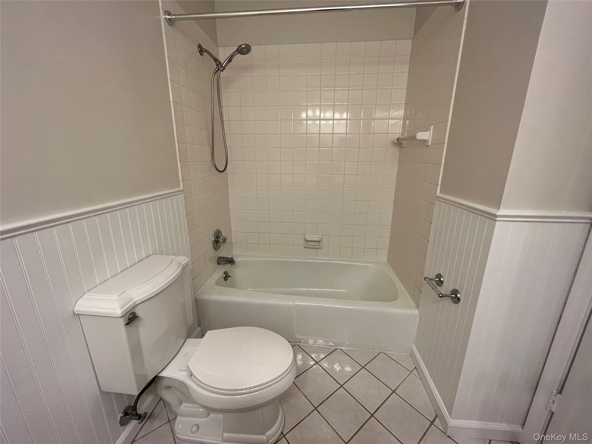 11 Wildwood Road, Unit 12 Katonah, NY 10536 - Photo 15 of 17 a bathroom with a toilet and a shower