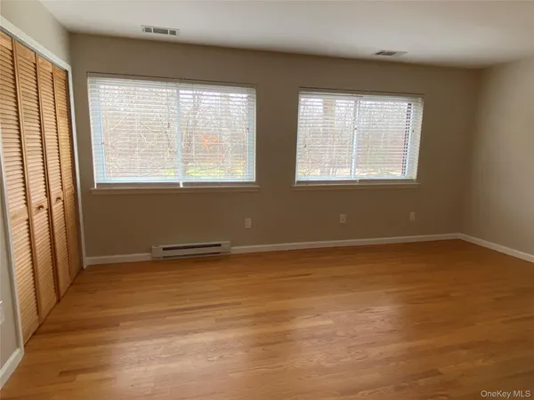 an empty room with windows