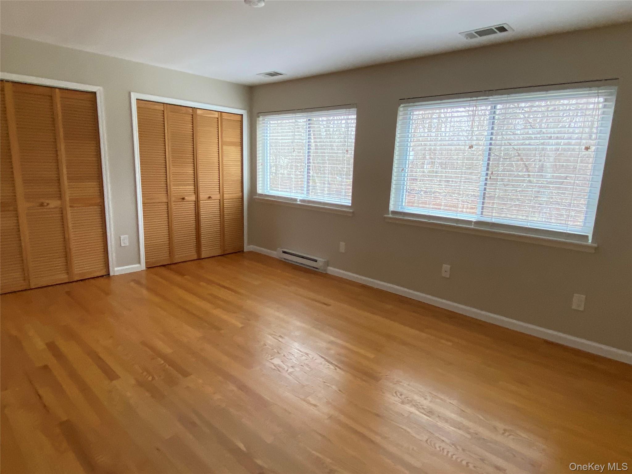 11 Wildwood Road, Unit 12 Katonah, NY 10536 - Photo 10 of 17 an empty room with windows
