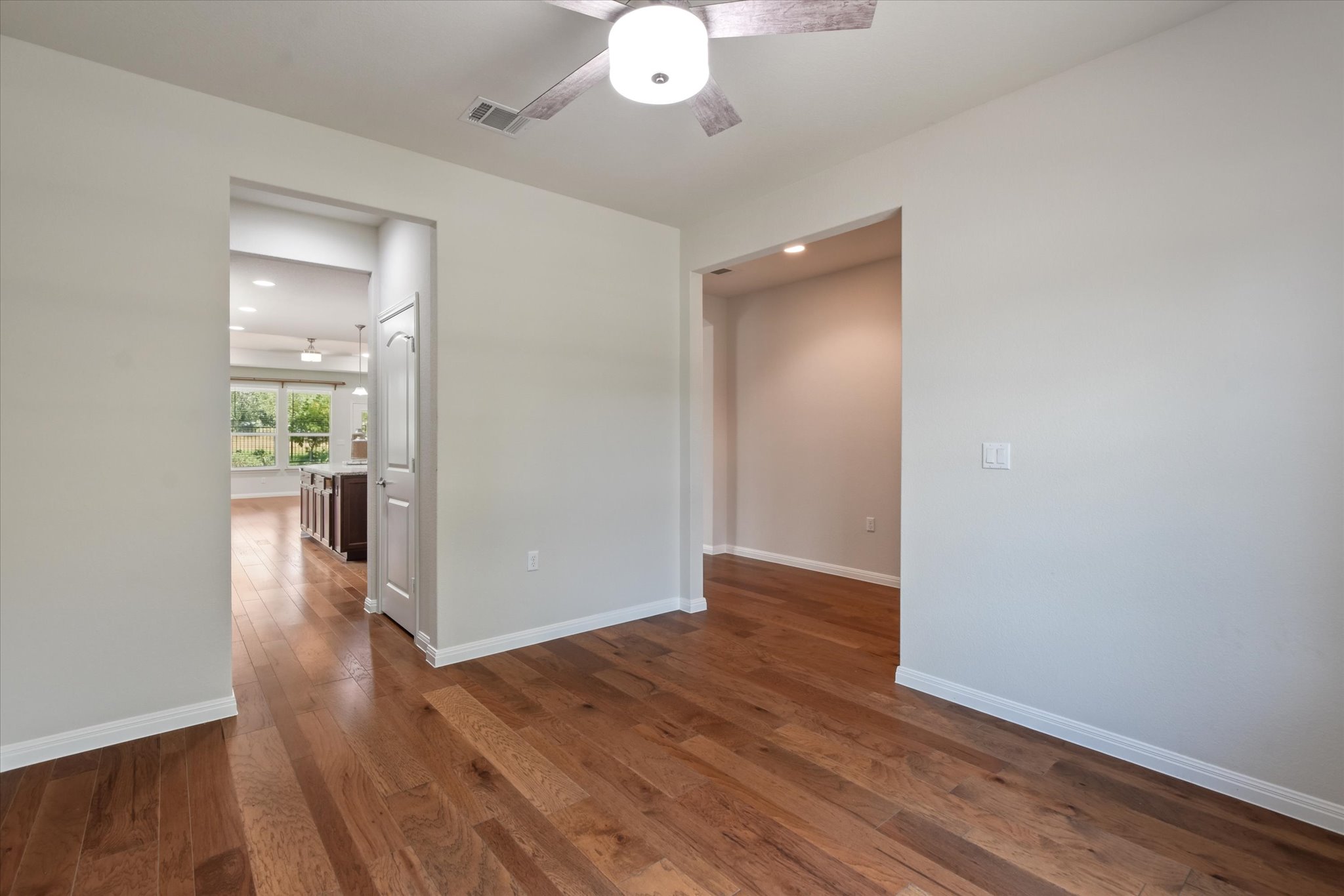 104 Coffee Mill Creek Road Georgetown, TX 78633 - Photo 6 of 40 Flex room leading to the Wet Bar and Kitchen.