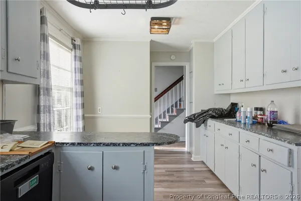 a bathroom with a sink and shower