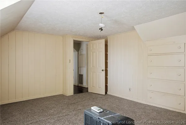 a view of a room with an empty space