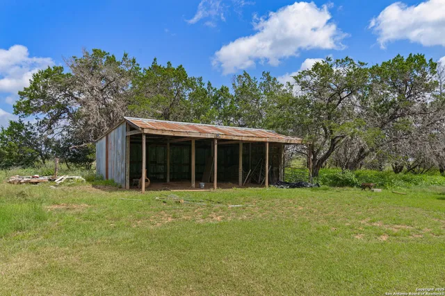 front view of a house with a big yard