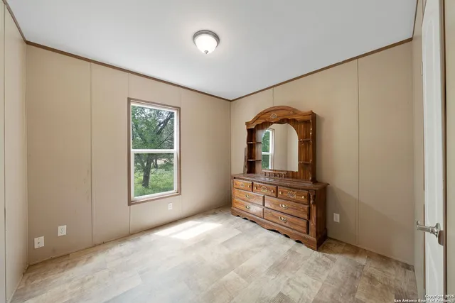 a room with closet and window