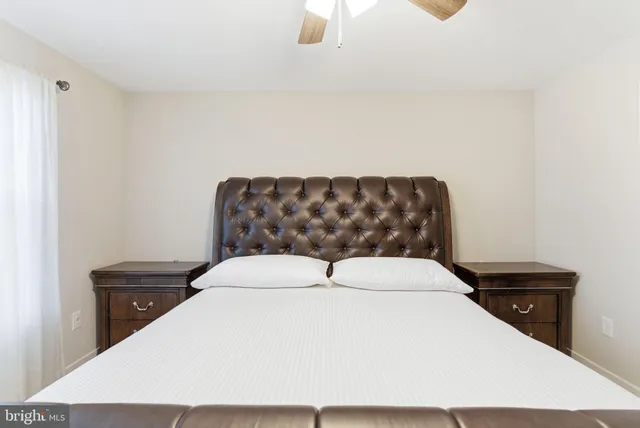 a bathroom with a sink double vanity and a mirror