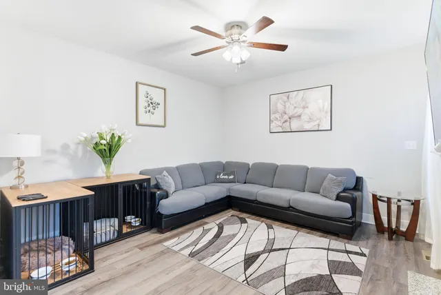 a bathroom with a white wall