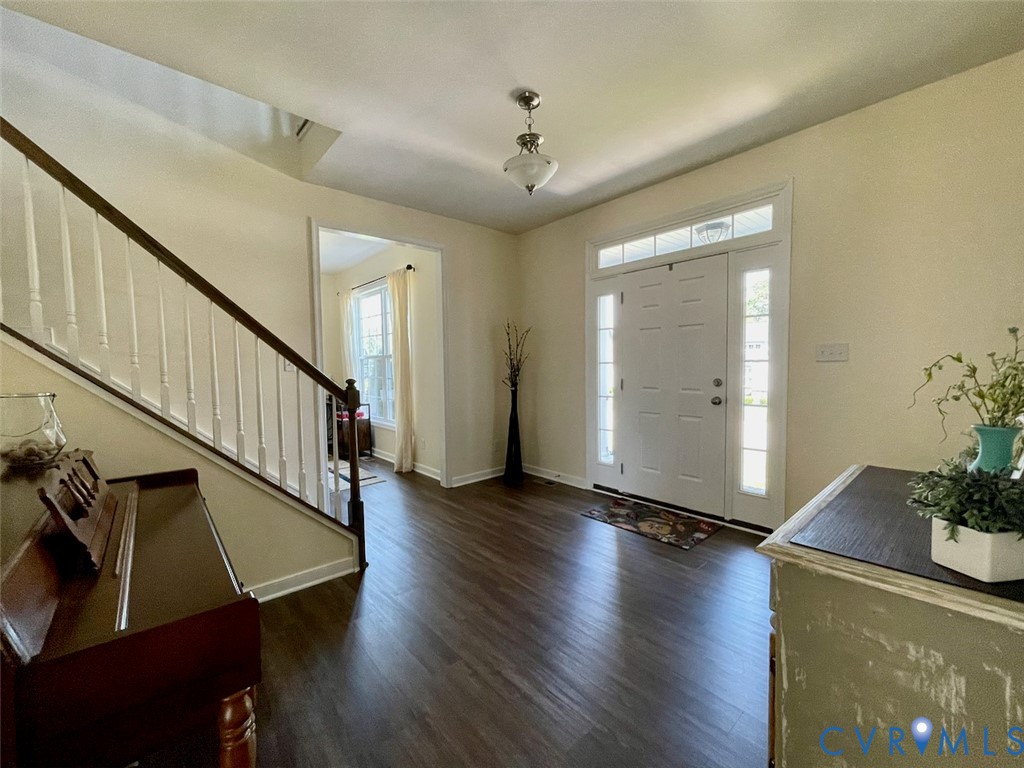 9506 Simonsville Road Midlothian, VA 23112 - Photo 3 of 27 a view of an entryway with wooden floor