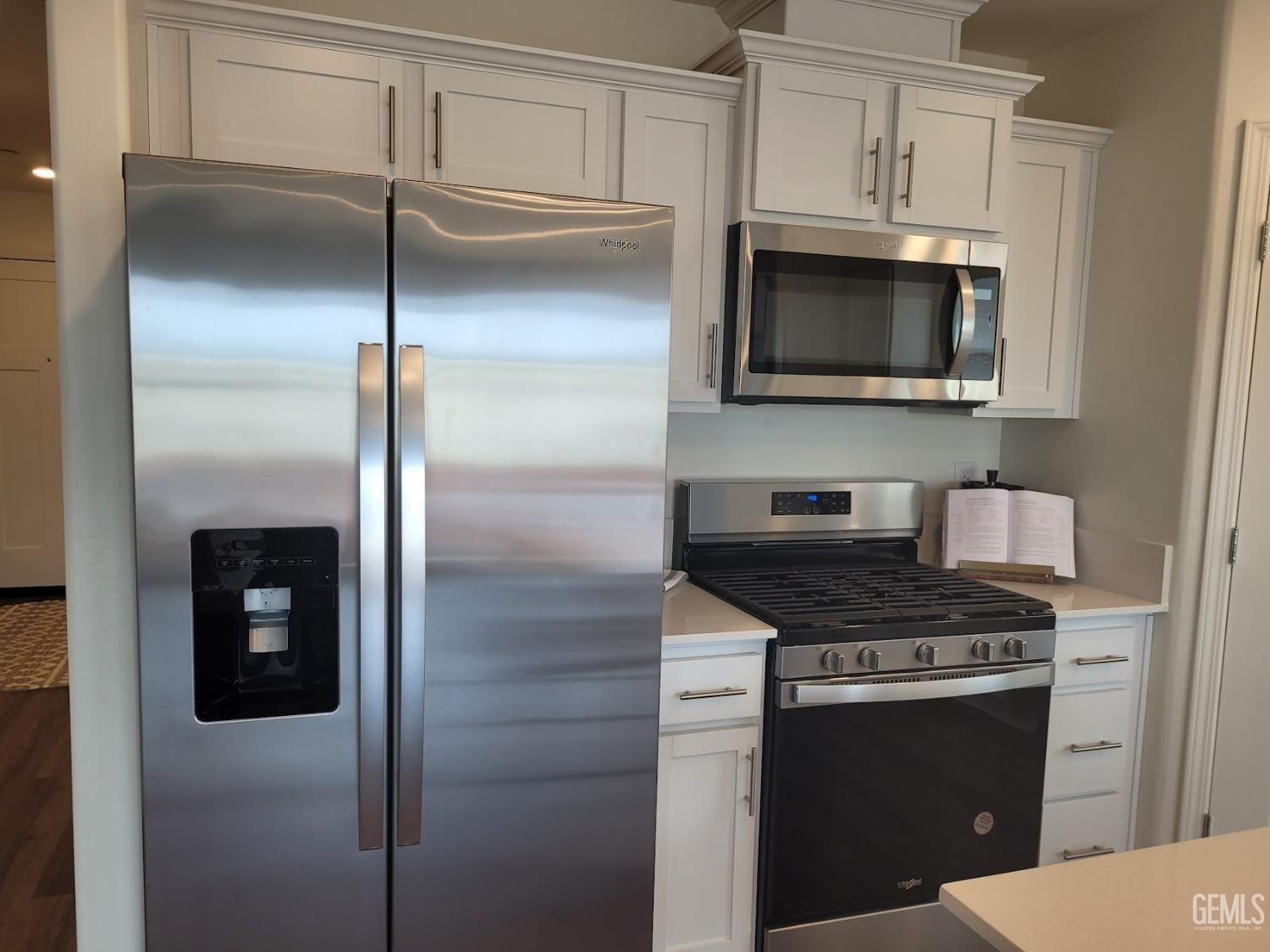 Undisclosed Address Bakersfield, CA 93313 - Photo 12 of 24 a kitchen with stainless steel appliances granite countertop a refrigerator a stove and a sink