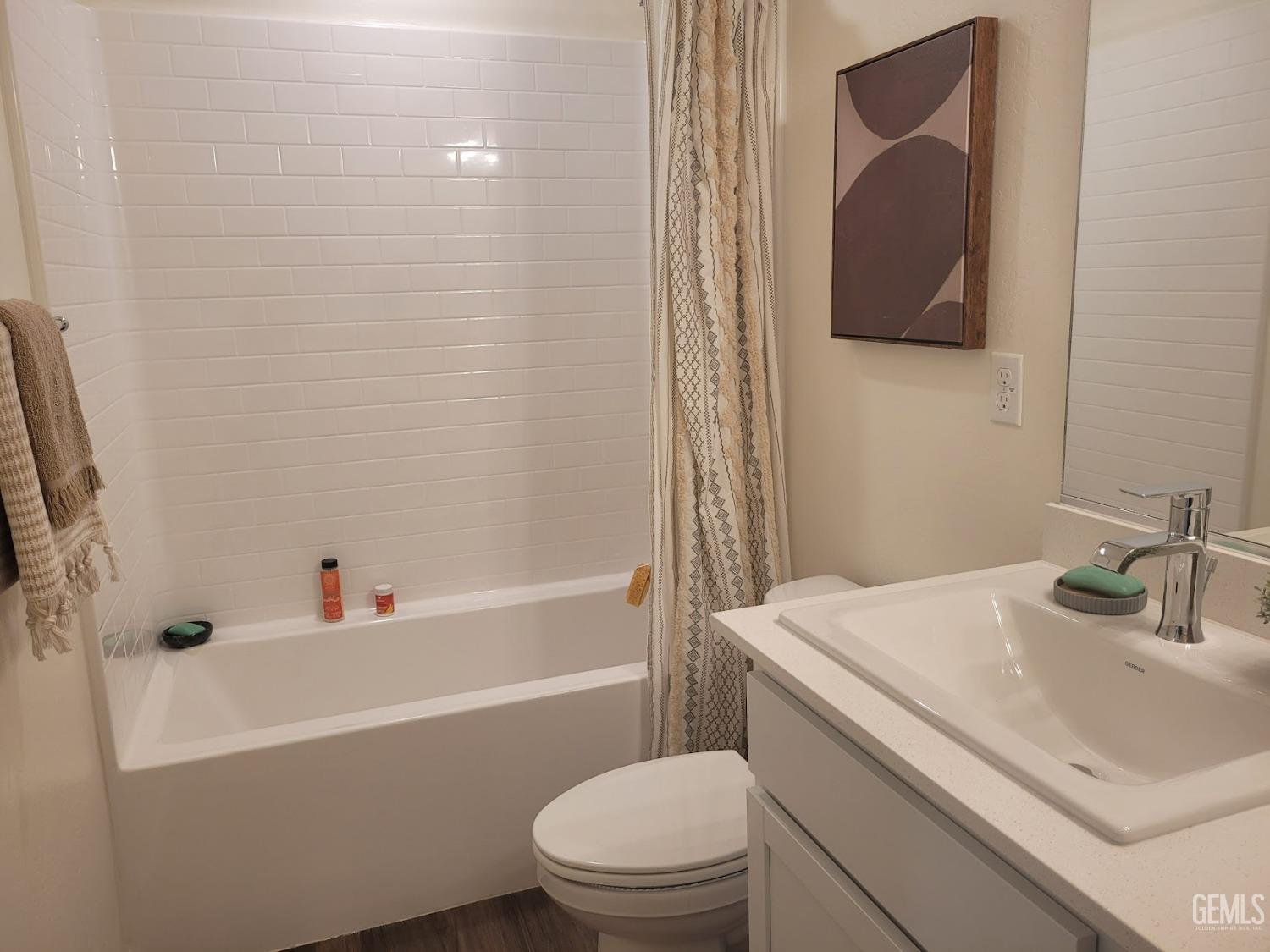 Undisclosed Address Bakersfield, CA 93313 - Photo 23 of 24 a bathroom with a sink toilet and a bathtub
