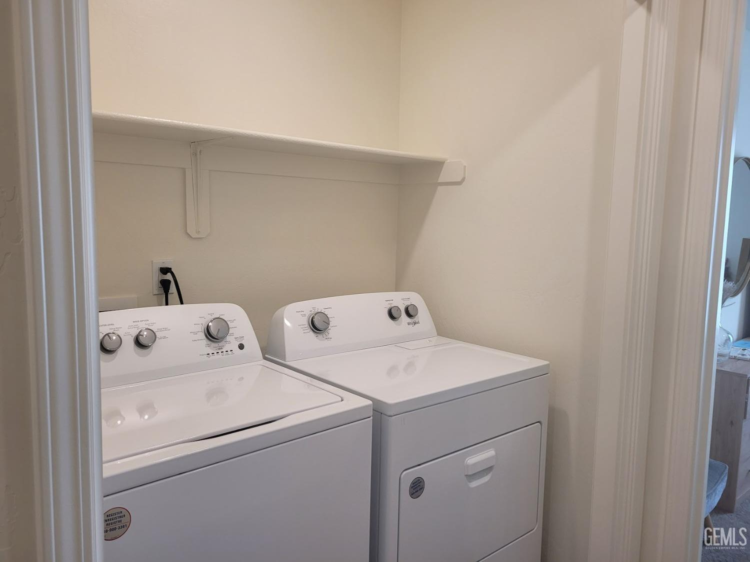 Undisclosed Address Bakersfield, CA 93313 - Photo 10 of 24 a utility room with dryer and washer