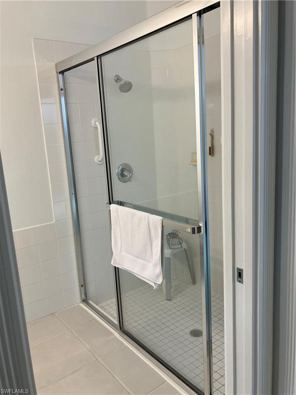 4080 Trinidad Way Naples, FL 34119 - Photo 11 of 15 a bathroom with a shower
