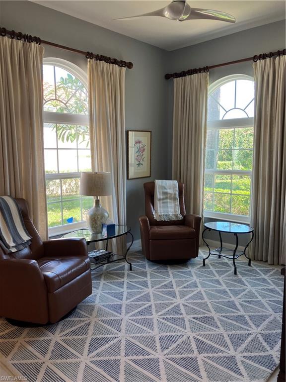4080 Trinidad Way Naples, FL 34119 - Photo 3 of 15 a living room with furniture and a window