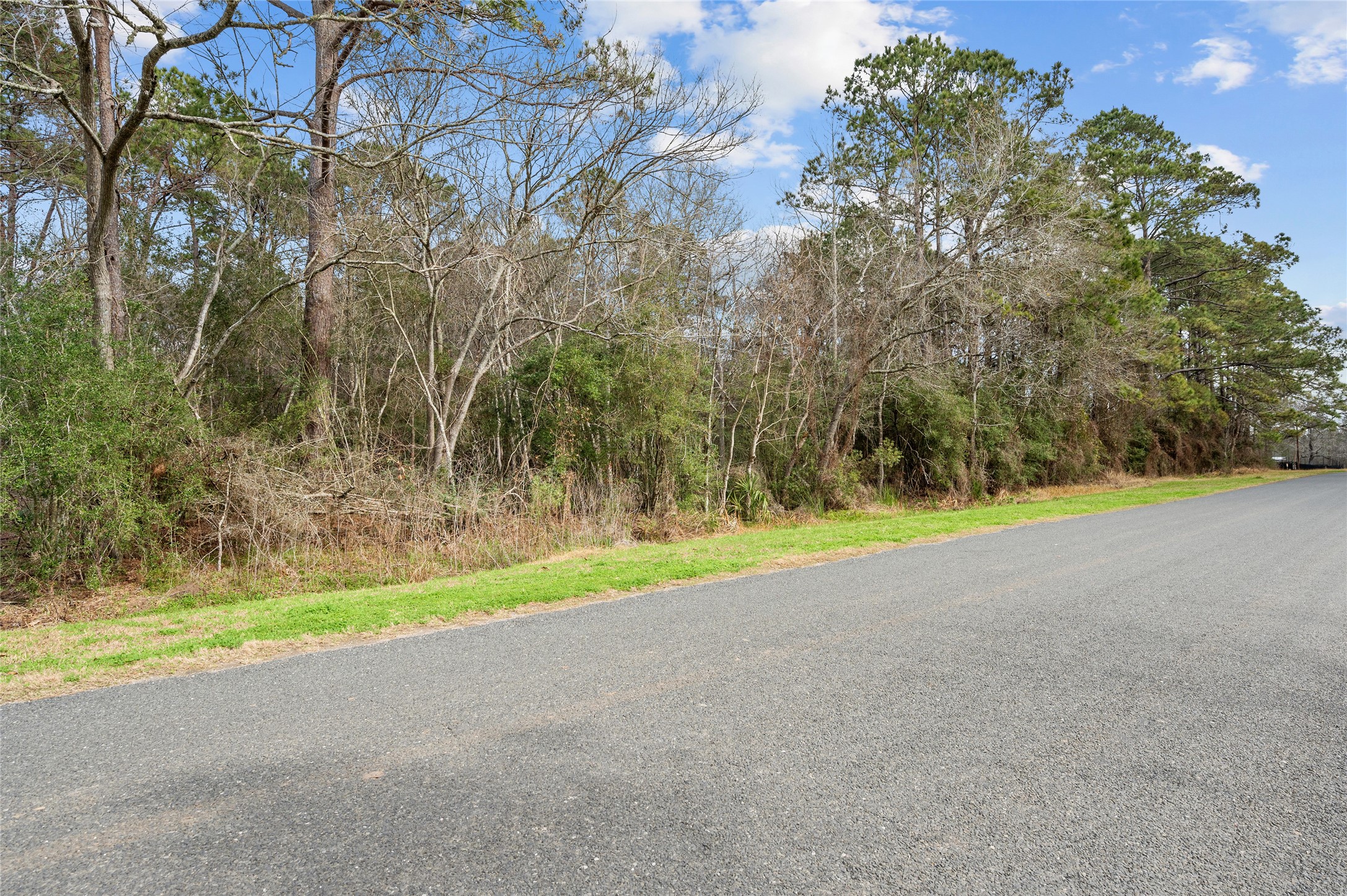 View from the street looking right toward FM 563