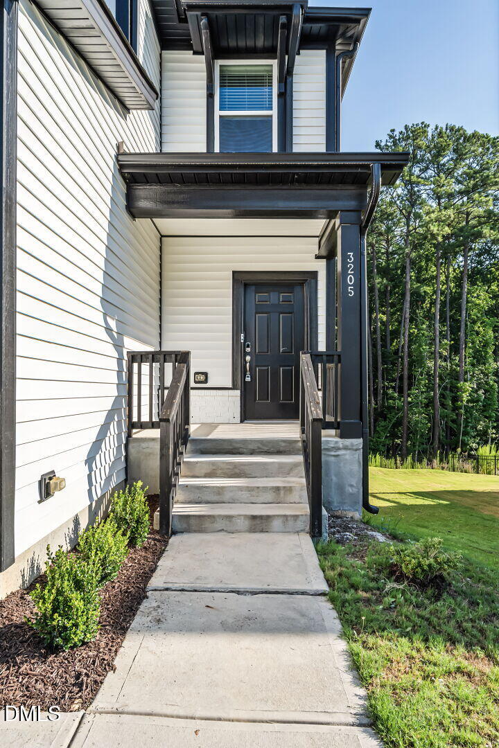 3205 Collaborative Way Raleigh, NC 27610 - Photo 2 of 34 a view of a entryway door front of house