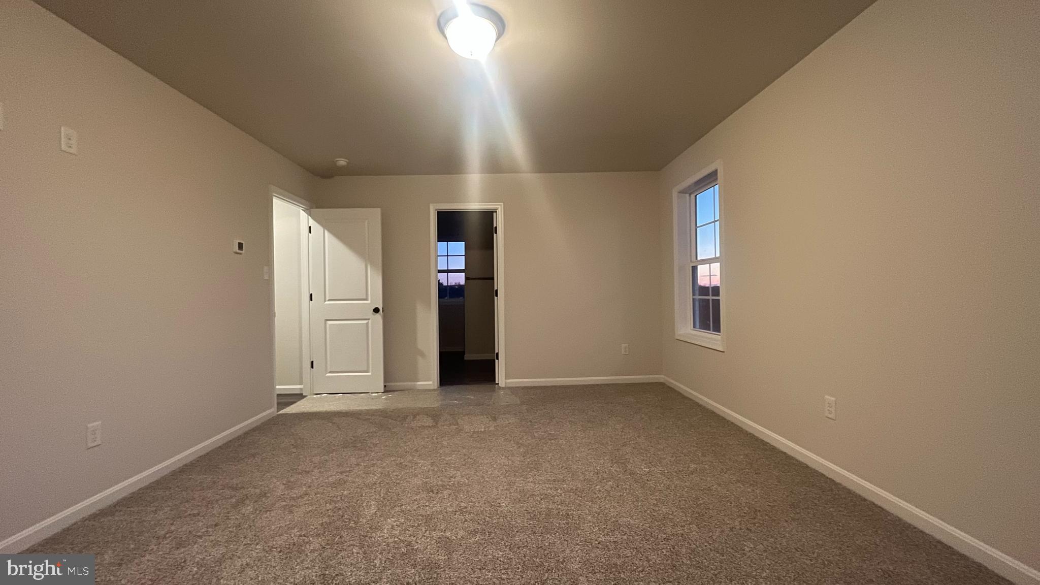10030 Pendleton Avenue Waynesboro, PA 17268 - Photo 21 of 36 an empty room with entrance and windows