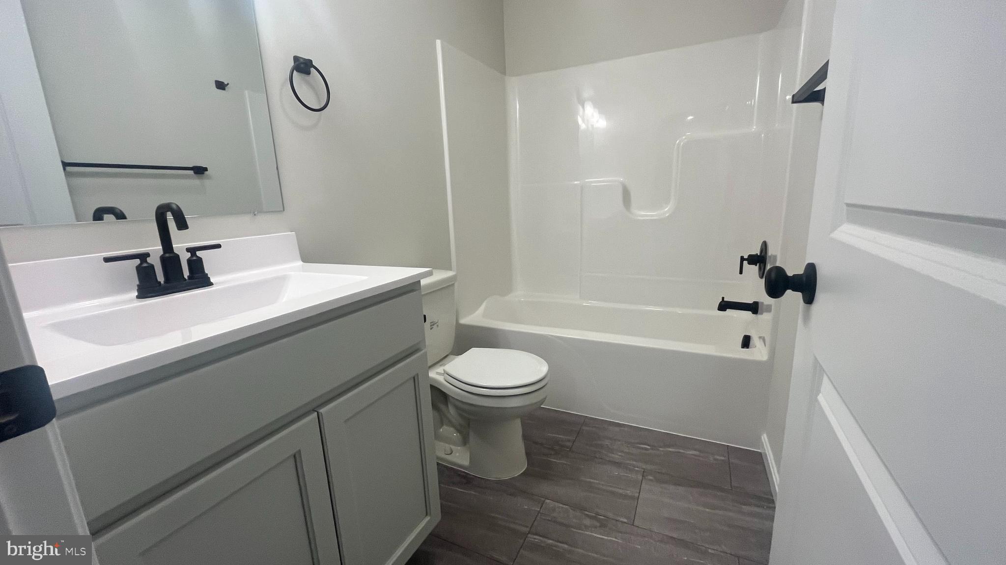10030 Pendleton Avenue Waynesboro, PA 17268 - Photo 29 of 36 a bathroom with a sink toilet vanity and shower