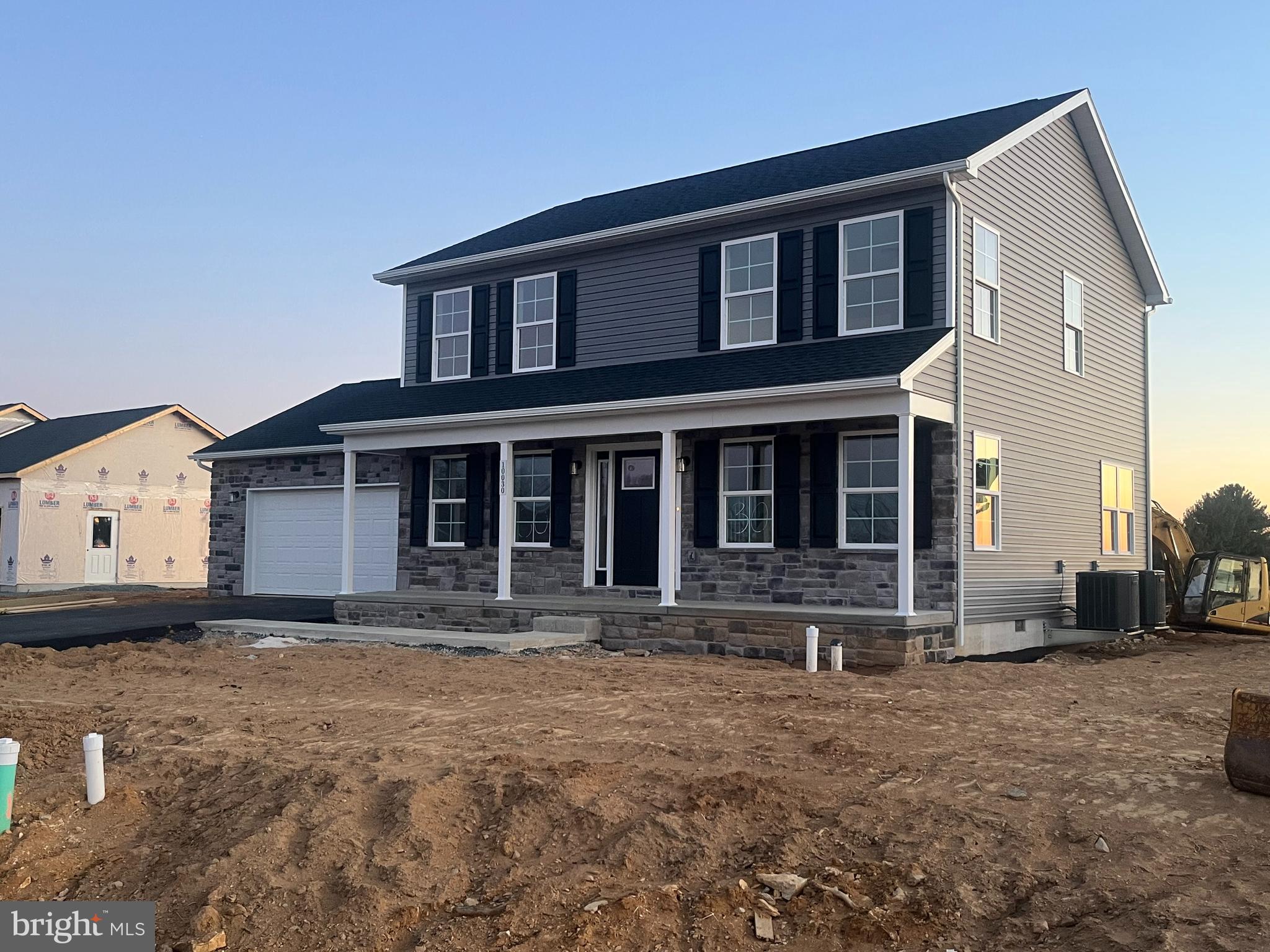 10030 Pendleton Avenue Waynesboro, PA 17268 - Photo 3 of 36 a front view of a house with a yard