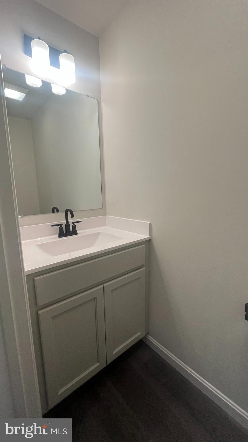 10030 Pendleton Avenue Waynesboro, PA 17268 - Photo 31 of 36 a bathroom with a sink vanity and a mirror