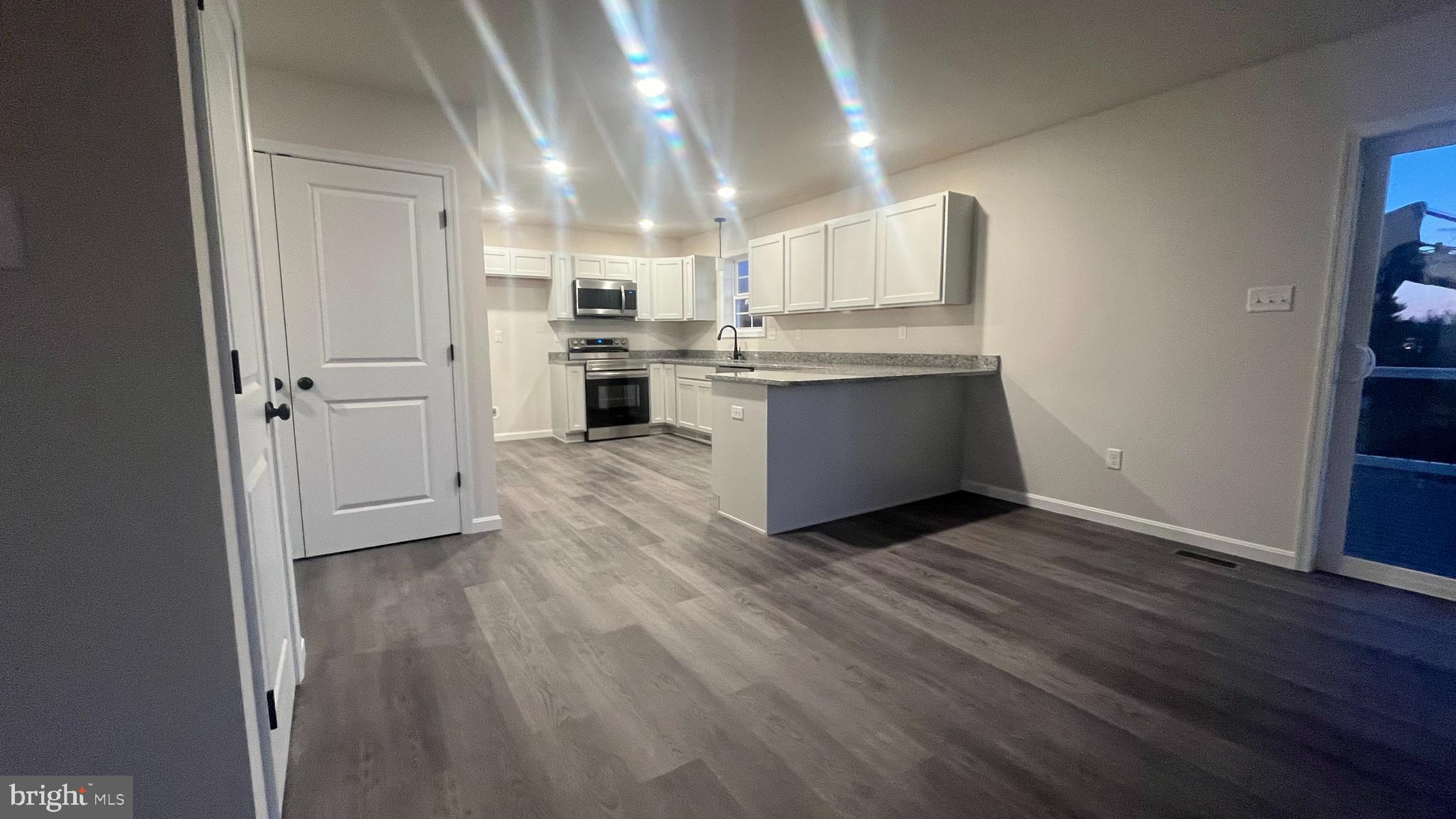 10030 Pendleton Avenue Waynesboro, PA 17268 - Photo 9 of 36 a view of kitchen with wooden floor