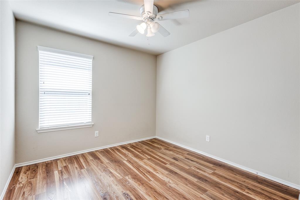 1101 Rainer Drive Princeton, TX 75407 - Photo 22 of 25 an empty room with a window