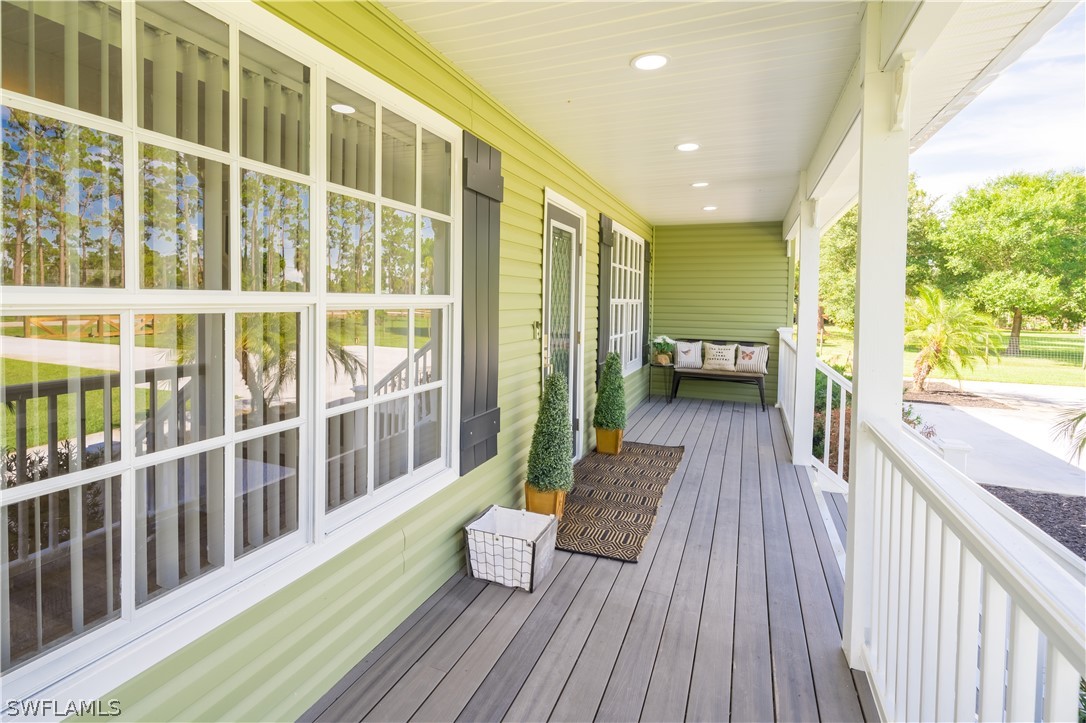 21510 North River Road Alva, FL 33920 - Photo 11 of 35 a view of a balcony with wooden floor